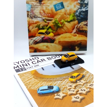 Fiat Nuova 500 2007 yellow (with Japanese book) - skala 1:64 - Kyosho